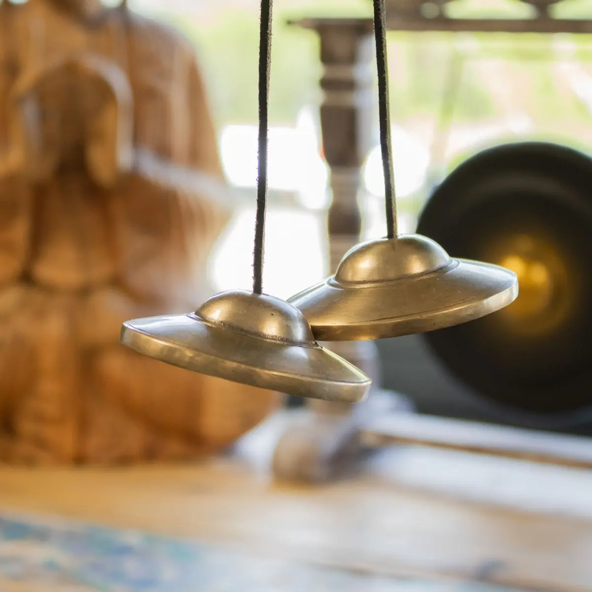 Plain brass Tibetan tingsha bells with a smooth finish
