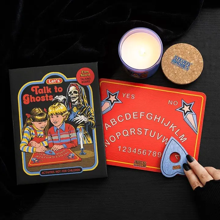 Let's Talk to Ghosts talking board with letters, numbers and planchette