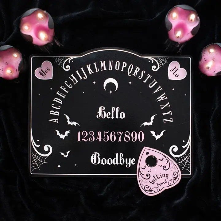 Pink and black cork talking board