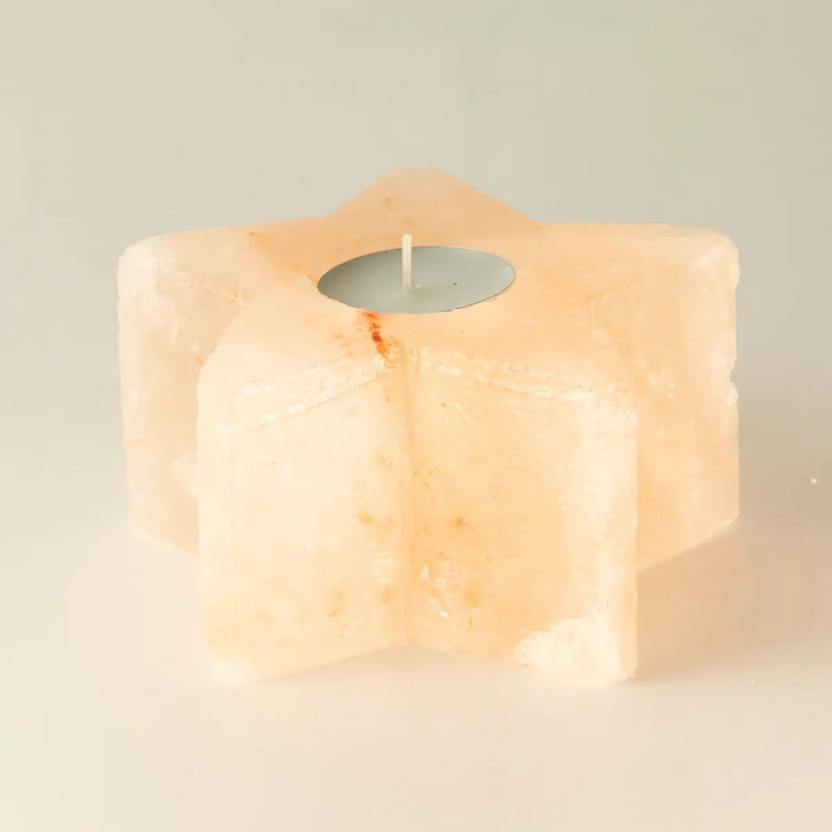 Himalayan salt candle holder in natural pink crystal salt rock