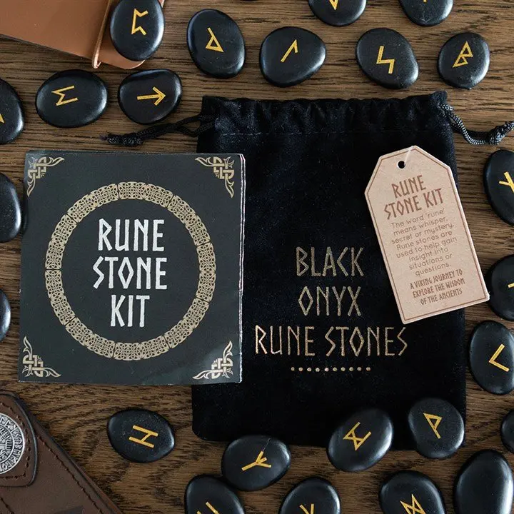 Set of polished black onyx rune stones with a drawstring pouch
