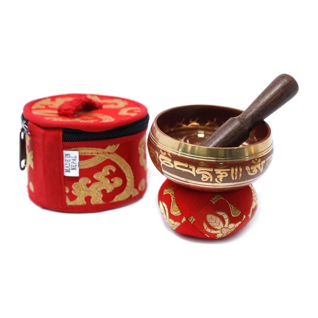 Mini brass singing bowl with cushion and wood stick